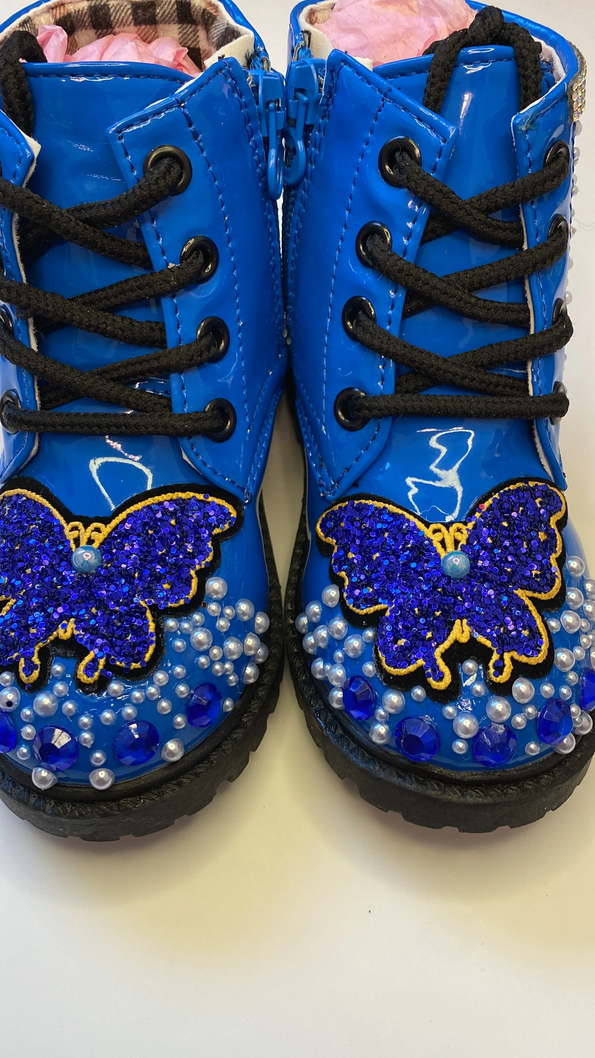 THE BLUE BUTTERFLY ON BLUE BOOTS